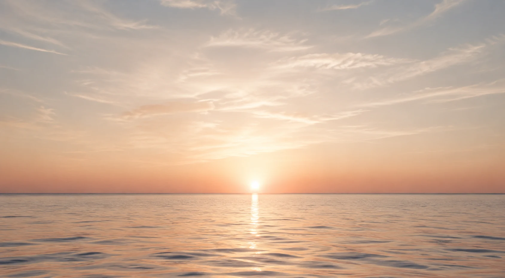 Sunrise over a calm sea